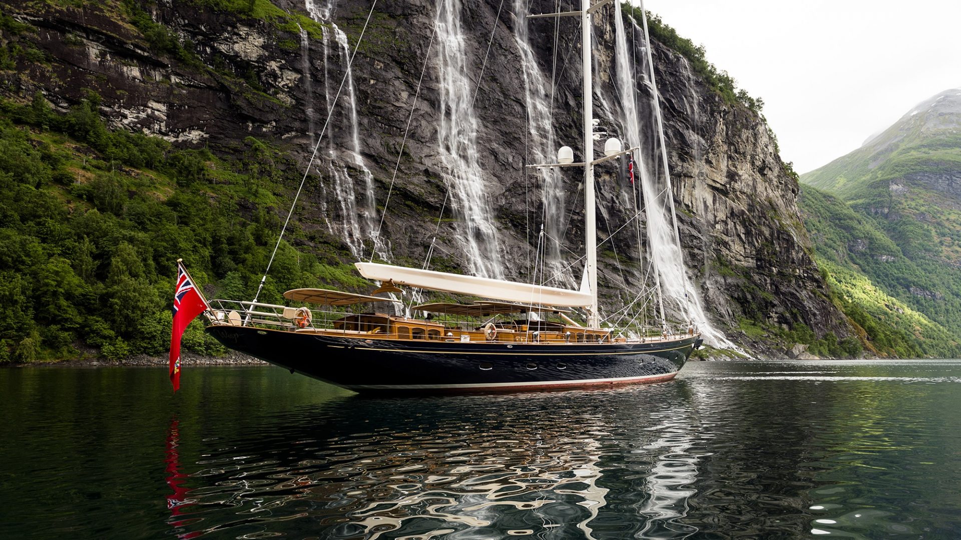 Yacht Wisp cruising the Geirangerfjord, a 156 foot (48 meter) sailing yacht built by Royal Huisman and designed by Hoek Design.